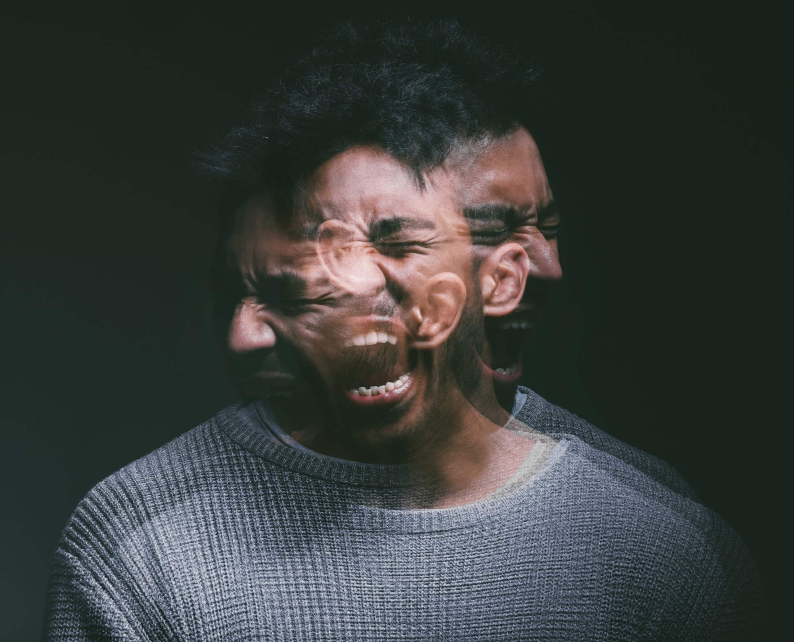 man severely suffering from major depression in a dark room in need of depression treatment in washington dc